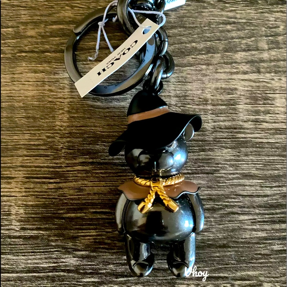 Authentic Wizard of Oz Coach Wicked Witch key chain.
